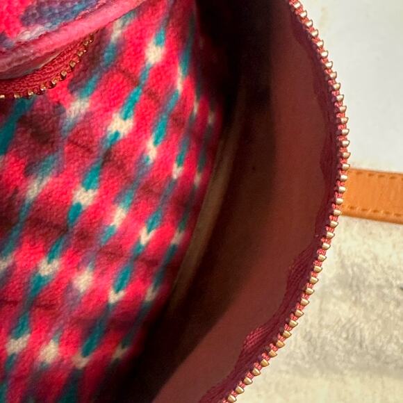 Tory Burch multicolor printed backpack with tan leather trim, top handle bag.